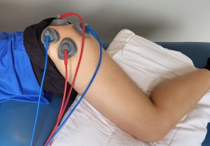suction ifc machine on a female patients lateral hip