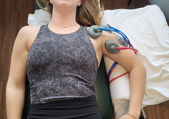 A female patient receiving heat treatment with IFC