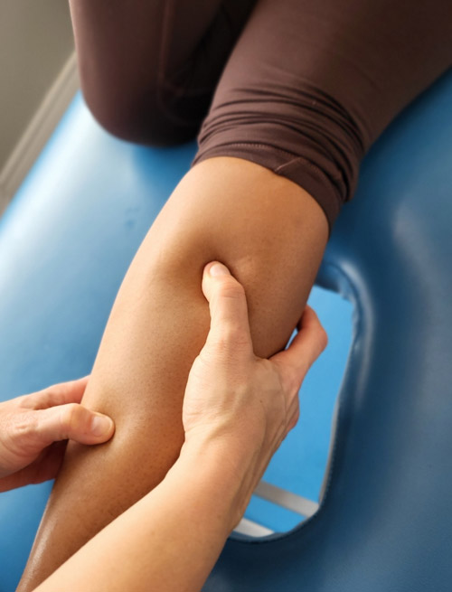 Physiotherapist using active release therapy for plantar fasciitis