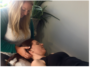 chiropractor adjusting a patients neck
