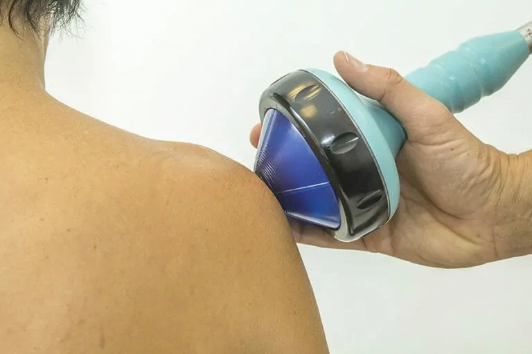 A patient receiving treatment for shoulder pain